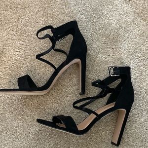 New worn black strapped heels